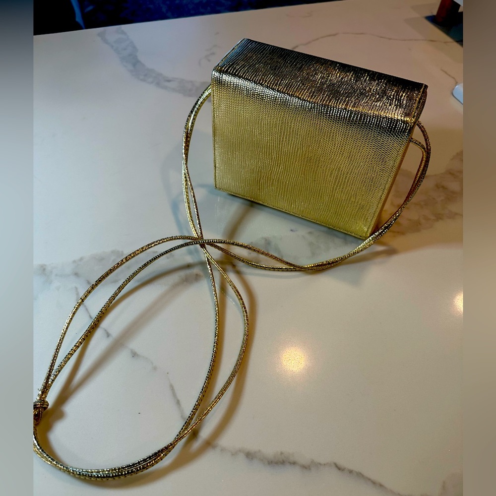 Vintage boxy (cross body) purse in gold faux snakeskin texture with mirror.